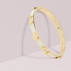 kate Spade Heritage Gold and White Enamel Hinged Cuff Bracelet
